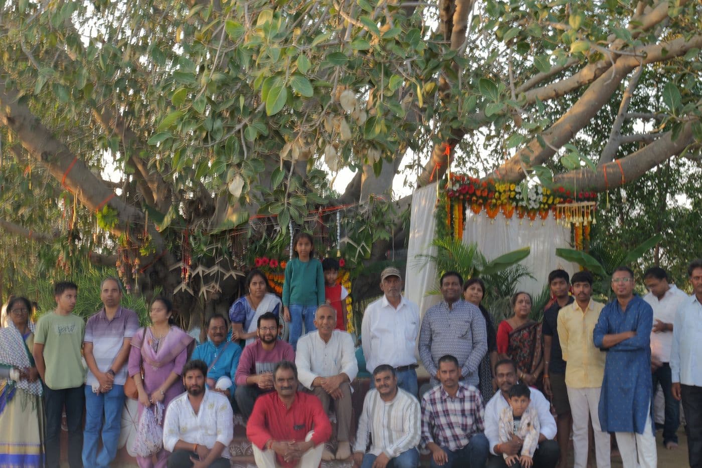 The community gathered under the banyan tree